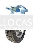 Caster; Rigid; 8"x2"; Flat Free; Plate (4"x4-1/2"; holes: 2-5/8"x3-5/8" slots to 3"x3"); Prec BB; 150#; Sawtooth Tread; Premium Hub; Brake (Swivel is #65085) (Item #63683)