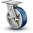 Caster; Swivel; 6" x 2"; PolyU on Alum; Plate (4-1/2"x6-1/4"; holes: 2-7/16"x4-15/16" slots to 3-3/8"x5-1/4"; 1/2" bolt); Roller Brng; 1200#; Brake (Item #63361)